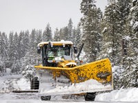 A winter storm brings chain control and delays on Interstate 80 East near Cisco Grove, Calif., on November 27, 2024. (