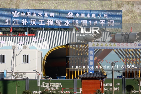 Workers work at the Longtanxi water intake site of the South-to-North Water Diversion project in the Three Gorges Reservoir area of Yichang,...