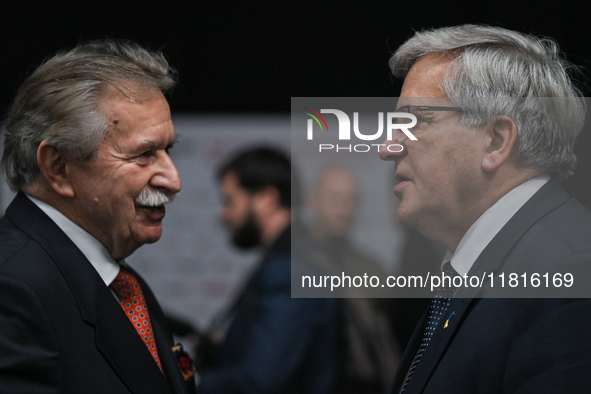 KRAKOW, POLAND - NOVEMBER 27:   
Bronislaw Komorowski (R), former President of Poland, chats with retired Polish Army Major General Leon Kom...