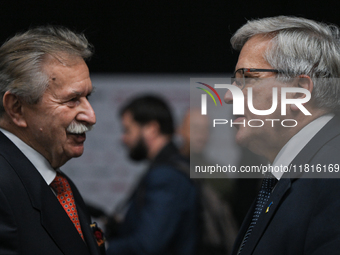 KRAKOW, POLAND - NOVEMBER 27:   
Bronislaw Komorowski (R), former President of Poland, chats with retired Polish Army Major General Leon Kom...