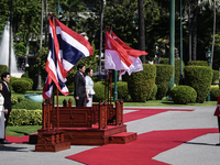 Singapore's Prime Minister Lawrence Wong and Thailand's Prime Minister Paetongtarn Shinawatra review the guard of honor during a welcoming c...