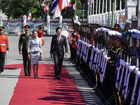 Singapore's Prime Minister Lawrence Wong and Thailand's Prime Minister Paetongtarn Shinawatra review the guard of honor during a welcoming c...