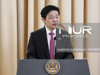 Singapore's Prime Minister Lawrence Wong speaks during a press conference at Government House in Bangkok, Thailand, on November 28, 2024. (