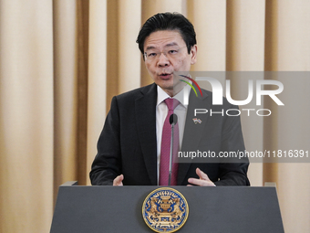 Singapore's Prime Minister Lawrence Wong speaks during a press conference at Government House in Bangkok, Thailand, on November 28, 2024. (