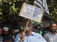 Activists of the Jamiat-e-Ulma Muslim organization participate in a protest against the WAQF Amendment Bill in Kolkata, India, on November 2...