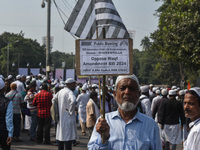 Activists of the Jamiat-e-Ulma Muslim organization participate in a protest against the WAQF Amendment Bill in Kolkata, India, on November 2...