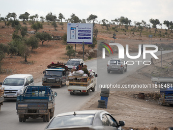 Hundreds of families have fled the eastern countryside of Idlib and western Aleppo due to ongoing attacks by regime forces, in Aleppo, Syria...