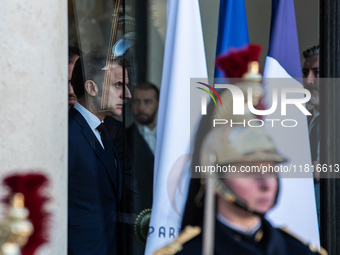 French President Emmanuel Macron and First Lady Brigitte receive Nigeria's President Bola Tinubo, who visits France for two days with the Fi...