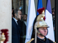 French President Emmanuel Macron and First Lady Brigitte receive Nigeria's President Bola Tinubo, who visits France for two days with the Fi...