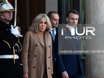 French President Emmanuel Macron and First Lady Brigitte receive Nigeria's President Bola Tinubo, who visits France for two days with the Fi...