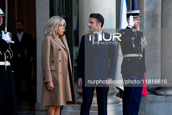 French President Emmanuel Macron and First Lady Brigitte receive Nigeria's President Bola Tinubo, who visits France for two days with the Fi...