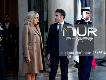 French President Emmanuel Macron and First Lady Brigitte receive Nigeria's President Bola Tinubo, who visits France for two days with the Fi...