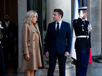 French President Emmanuel Macron and First Lady Brigitte receive Nigeria's President Bola Tinubo, who visits France for two days with the Fi...