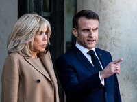 French President Emmanuel Macron and First Lady Brigitte receive Nigeria's President Bola Tinubo, who visits France for two days with the Fi...