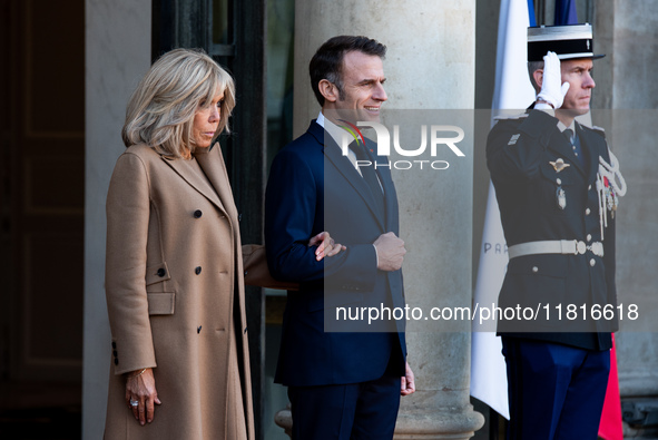 French President Emmanuel Macron and First Lady Brigitte receive Nigeria's President Bola Tinubo, who visits France for two days with the Fi...