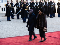 French President Emmanuel Macron and First Lady Brigitte receive Nigeria's President Bola Tinubo, who visits France for two days with the Fi...