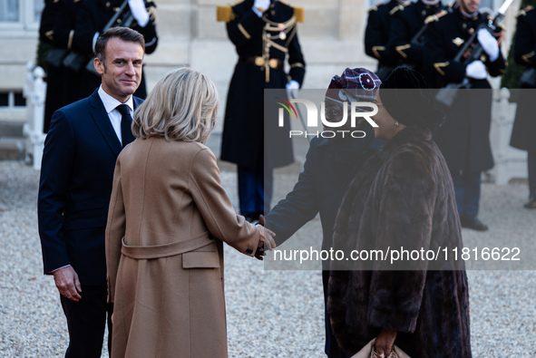 French President Emmanuel Macron and First Lady Brigitte receive Nigeria's President Bola Tinubo, who visits France for two days with the Fi...