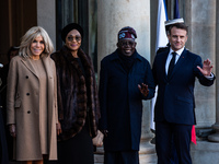 French President Emmanuel Macron and First Lady Brigitte receive Nigeria's President Bola Tinubo, who visits France for two days with the Fi...