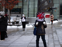 Members of the animal rights group CARE gather near the Chinese Embassy in Myeong-dong to call for the enactment of animal protection laws i...