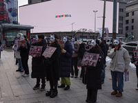 Members of the animal rights group CARE gather near the Chinese Embassy in Myeong-dong to call for the enactment of animal protection laws i...