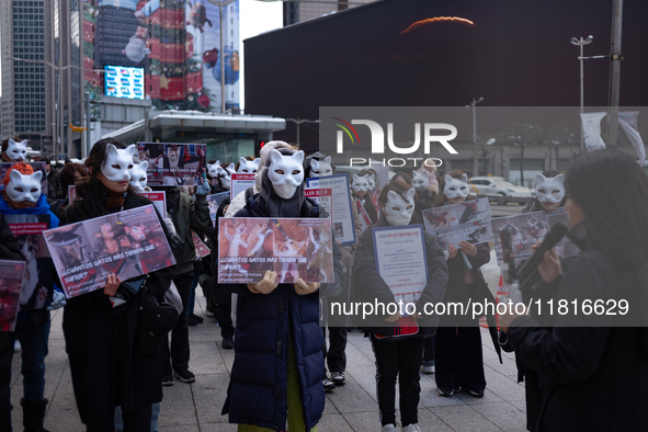 Members of the animal rights group CARE gather near the Chinese Embassy in Myeong-dong to call for the enactment of animal protection laws i...