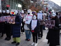 Members of the animal rights group CARE gather near the Chinese Embassy in Myeong-dong to call for the enactment of animal protection laws i...