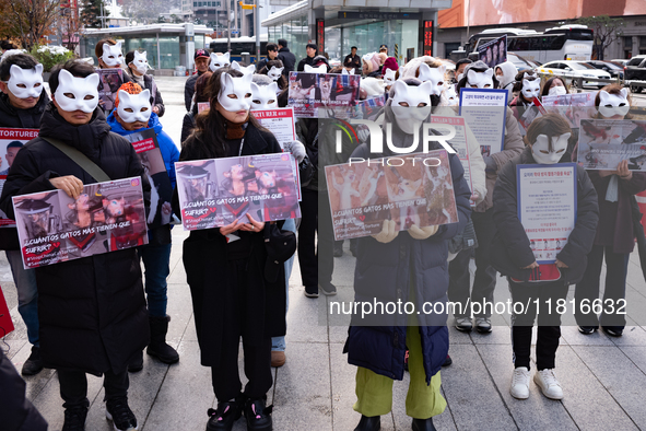 Members of the animal rights group CARE gather near the Chinese Embassy in Myeong-dong to call for the enactment of animal protection laws i...