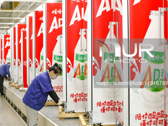 Commercial refrigerated display cabinets are taken offline at Qingdao Hairong Commercial Cold Chain Co., Ltd. in Qingdao, China, on November...