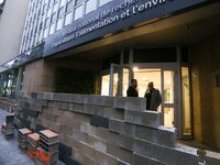 French farmers construct a symbolic wall in front of the French National Institute for Agricultural Research (INRAE) head office to represen...