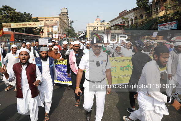 Jamiat E Ulama Bangla supporters take part in a protest meeting against the ongoing conflict in Gaza between Israel and Hamas and the WAQF A...