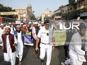 Jamiat E Ulama Bangla supporters take part in a protest meeting against the ongoing conflict in Gaza between Israel and Hamas and the WAQF A...