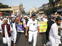 Jamiat E Ulama Bangla supporters take part in a protest meeting against the ongoing conflict in Gaza between Israel and Hamas and the WAQF A...