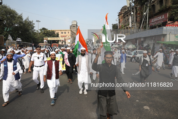 Jamiat E Ulama Bangla supporters take part in a protest meeting against the ongoing conflict in Gaza between Israel and Hamas and the WAQF A...