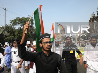 Jamiat E Ulama Bangla supporters take part in a protest meeting against the ongoing conflict in Gaza between Israel and Hamas and the WAQF A...