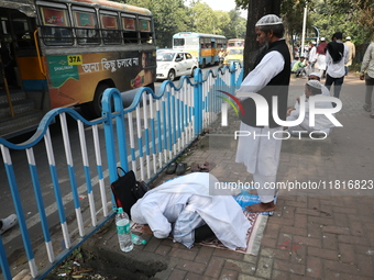 Jamiat E Ulama Bangla supporters take part in a protest meeting against the ongoing conflict in Gaza between Israel and Hamas and the WAQF A...