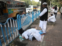 Jamiat E Ulama Bangla supporters take part in a protest meeting against the ongoing conflict in Gaza between Israel and Hamas and the WAQF A...