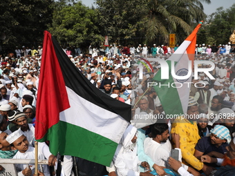 Jamiat E Ulama Bangla supporters take part in a protest meeting against the ongoing conflict in Gaza between Israel and Hamas and the WAQF A...