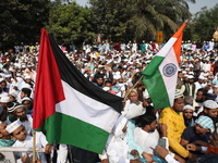 Jamiat E Ulama Bangla supporters take part in a protest meeting against the ongoing conflict in Gaza between Israel and Hamas and the WAQF A...