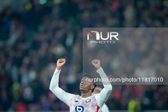 Jonathan David of LOSC Lille celebrates the victory during the UEFA Champions League 2024/25 League Phase MD5 match between Bologna FC and L...