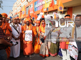 Members of Hindu Jagaran Monch shout slogans during a protest march towards the Bangladesh consulate against the recent arrest of ISKCON Ban...