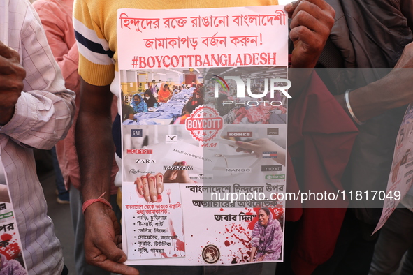 Members of Hindu Jagaran Monch shout slogans during a protest march towards the Bangladesh consulate against the recent arrest of ISKCON Ban...