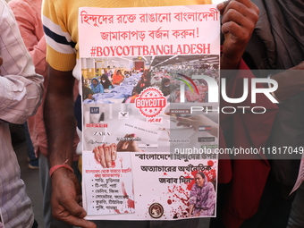 Members of Hindu Jagaran Monch shout slogans during a protest march towards the Bangladesh consulate against the recent arrest of ISKCON Ban...