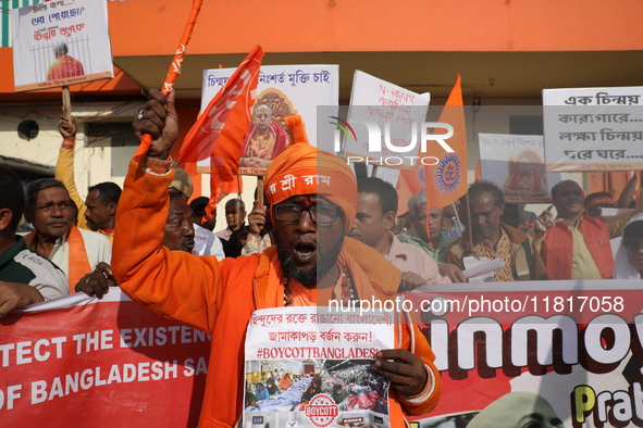 Members of Hindu Jagaran Monch shout slogans during a protest march towards the Bangladesh consulate against the recent arrest of ISKCON Ban...