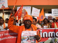 Members of Hindu Jagaran Monch shout slogans during a protest march towards the Bangladesh consulate against the recent arrest of ISKCON Ban...