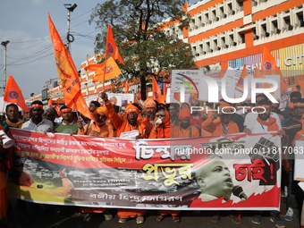 Members of Hindu Jagaran Monch shout slogans during a protest march towards the Bangladesh consulate against the recent arrest of ISKCON Ban...