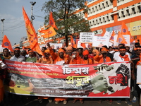 Members of Hindu Jagaran Monch shout slogans during a protest march towards the Bangladesh consulate against the recent arrest of ISKCON Ban...