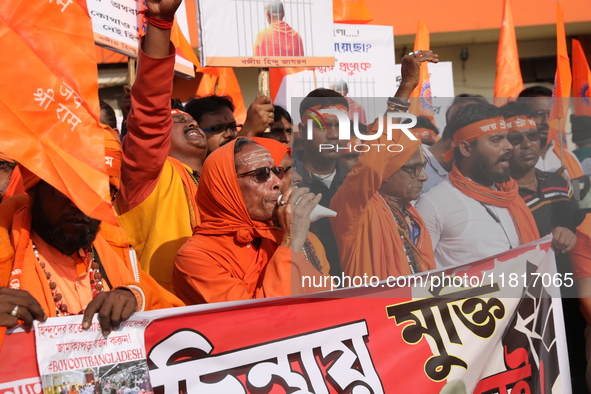 Members of Hindu Jagaran Monch shout slogans during a protest march towards the Bangladesh consulate against the recent arrest of ISKCON Ban...