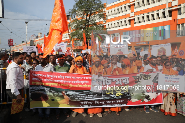 Members of Hindu Jagaran Monch shout slogans during a protest march towards the Bangladesh consulate against the recent arrest of ISKCON Ban...