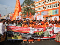 Members of Hindu Jagaran Monch shout slogans during a protest march towards the Bangladesh consulate against the recent arrest of ISKCON Ban...