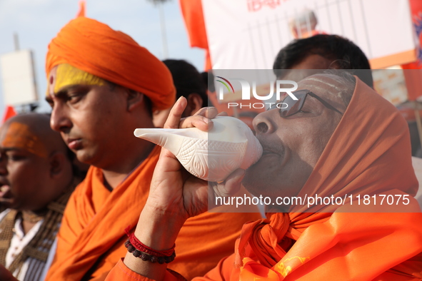 Members of Hindu Jagaran Monch shout slogans during a protest march towards the Bangladesh consulate against the recent arrest of ISKCON Ban...